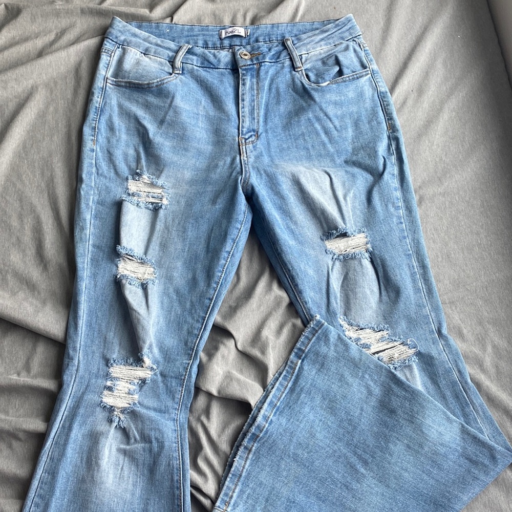 Woman’s Denim ripped flare jeans